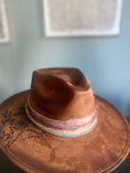 Load image into Gallery viewer, Flatbrim hat that has cream,pinks and blues with dried florals and it says Hand Letter Burned "Jesus Girl" on the side of the hat.