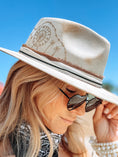 Load image into Gallery viewer, Close up lifestyle picture of The Coachella Hat Styled for Coachella Event.
